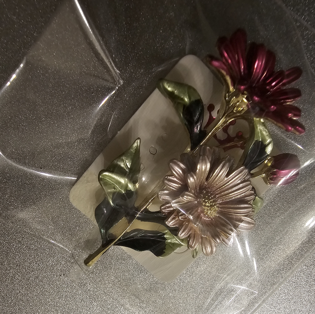 Brooch.
